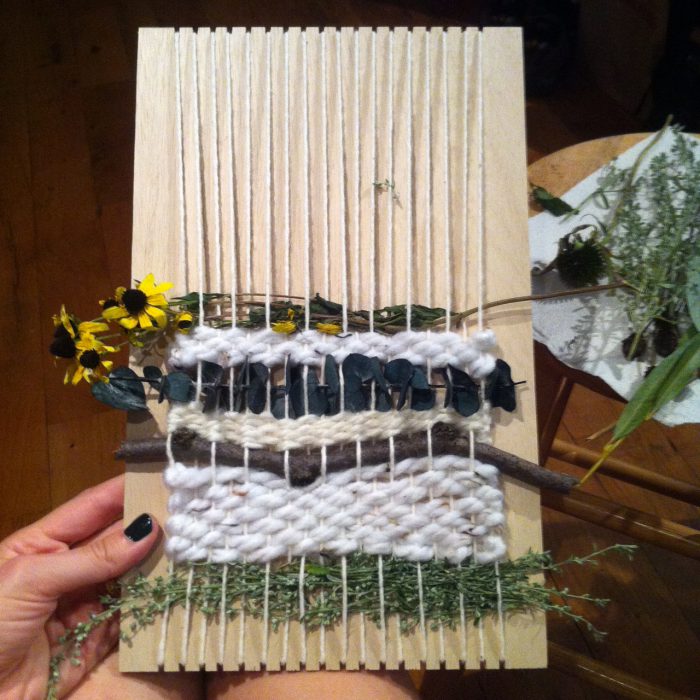 weaving on wood with flowers and fabric